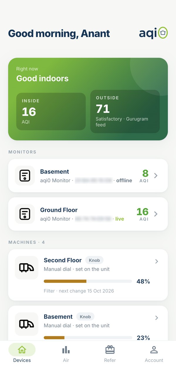 The aqi0 app home screen — indoor AQI 16 against 71 outside, with the monitors and machines in the home listed below
