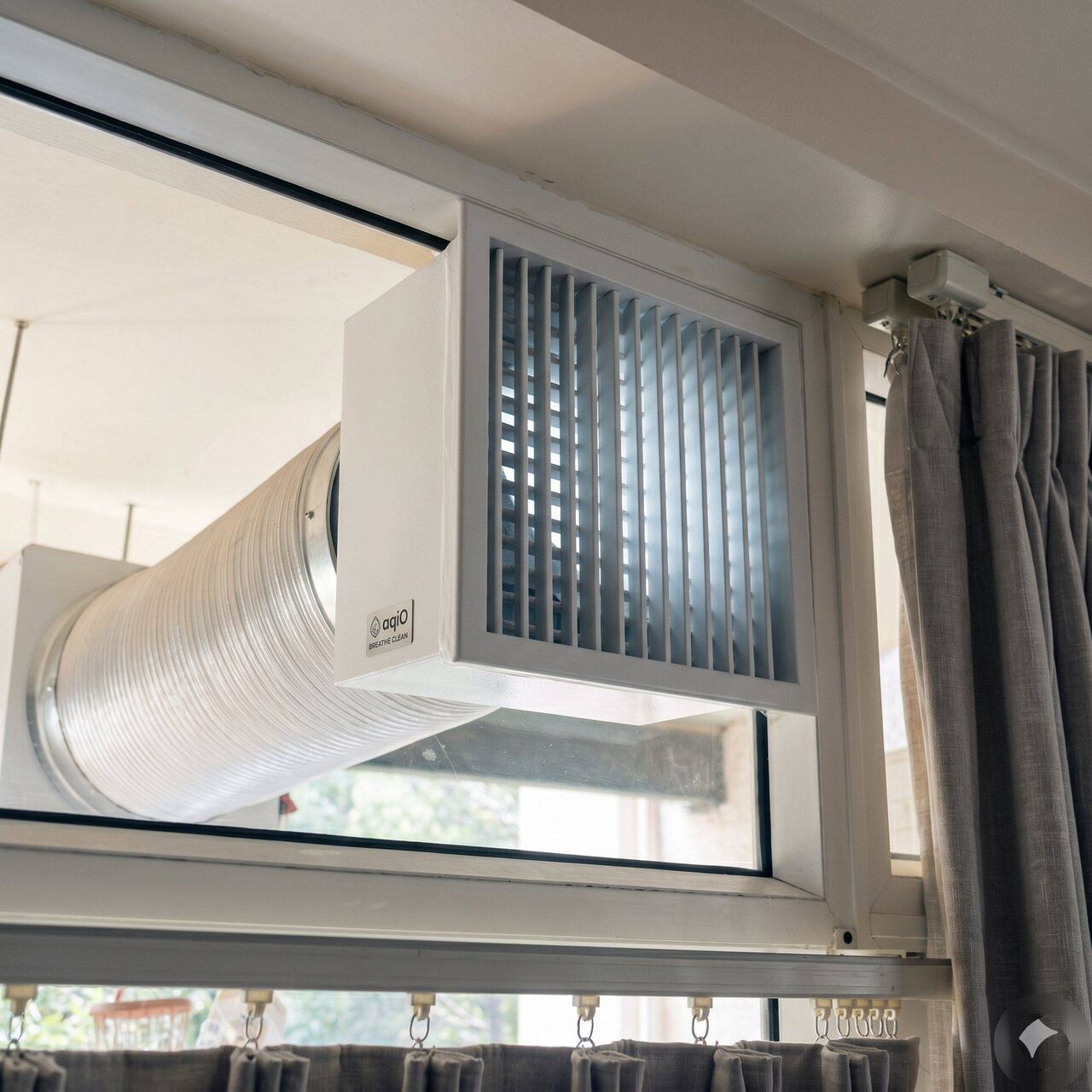 aqi0 ceiling diffuser inside a living room