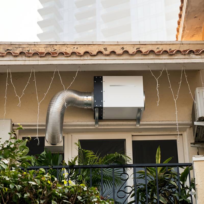 Exterior façade view showing aqi0 grille placement at eaves level